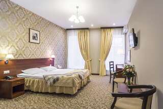 Гостиница М-Отель Санкт-Петербург Улучшенный двухместный номер с 1 кроватью или 2 отдельными кроватями-2